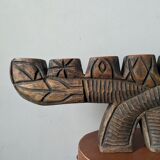 Hand-carved wooden candle holder, ethnic tribal style.