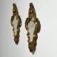 Pair of mirrors in wood decorated with gold leaf.