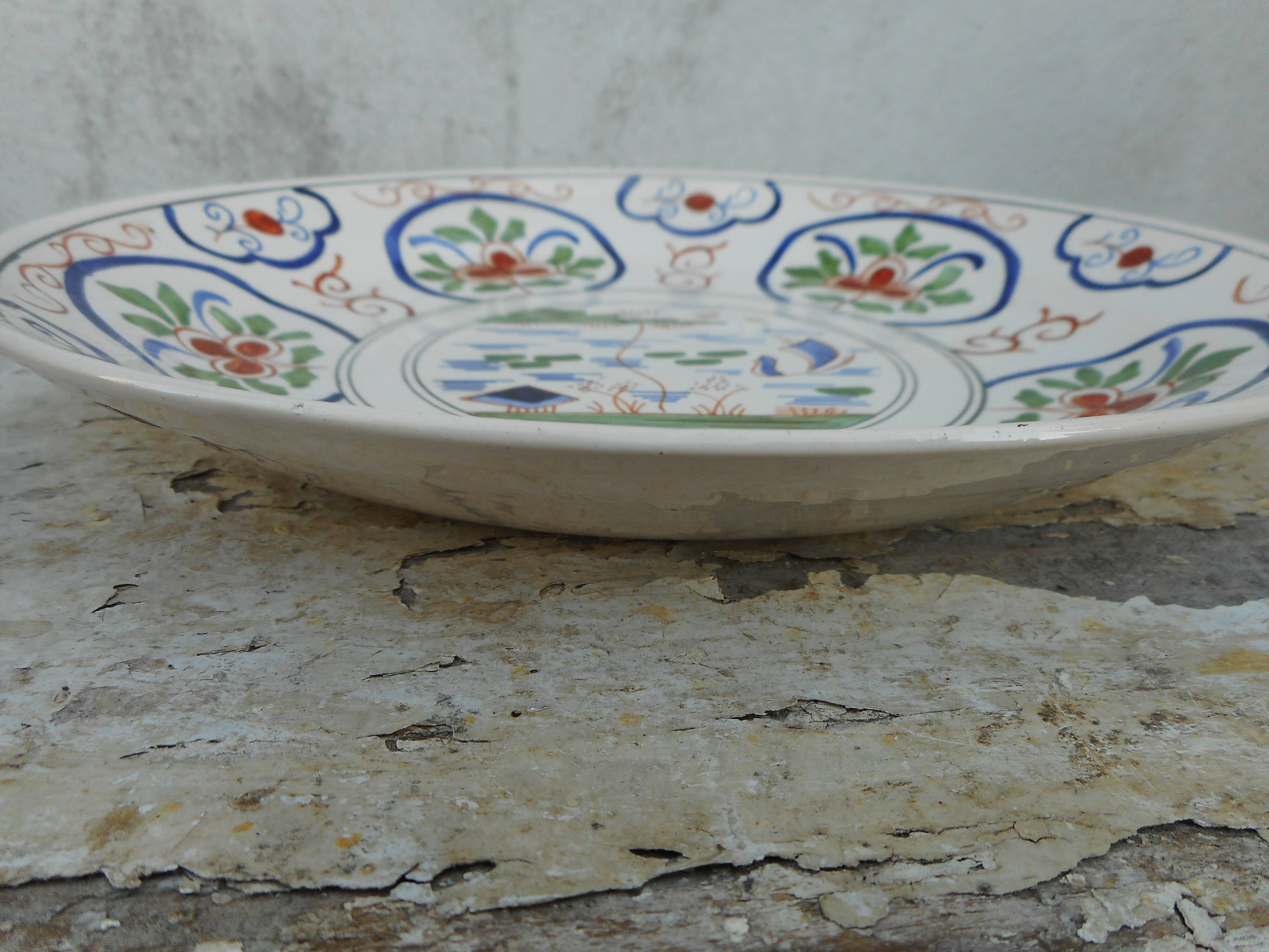 Ancient plate in earthenware