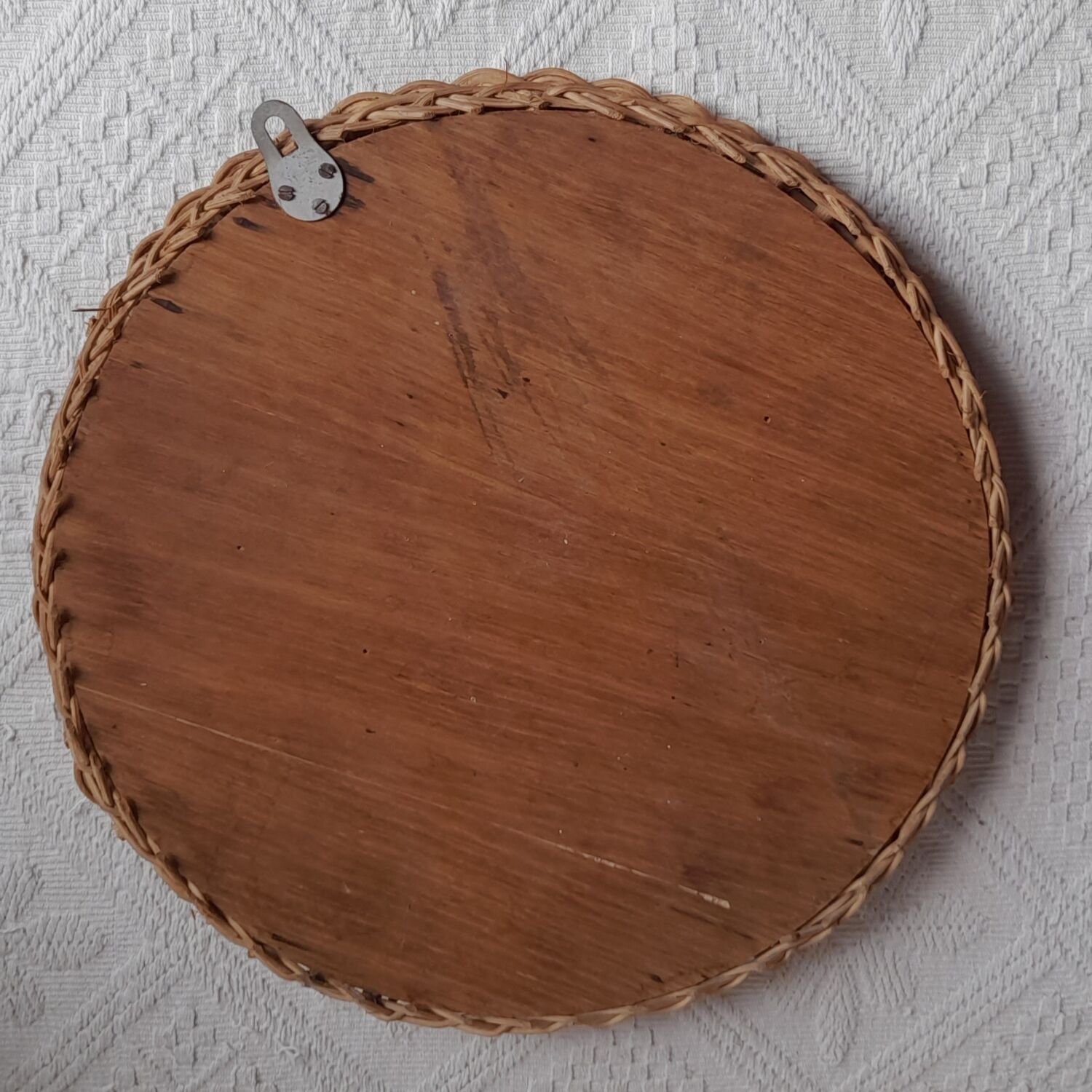 Old vintage braided rattan mirror