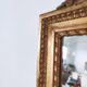 Miroir de cheminée en bois doré à décor de nœud et de roses H : 164 cm