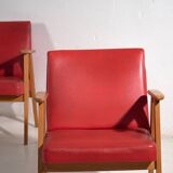 2 red armchairs, circa 1960