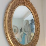 Miroir ovale 19 eme en bois et stuc doré