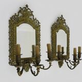 Pair of 3-light beveled mirror wall lights in Napoleon style, gilded bronze