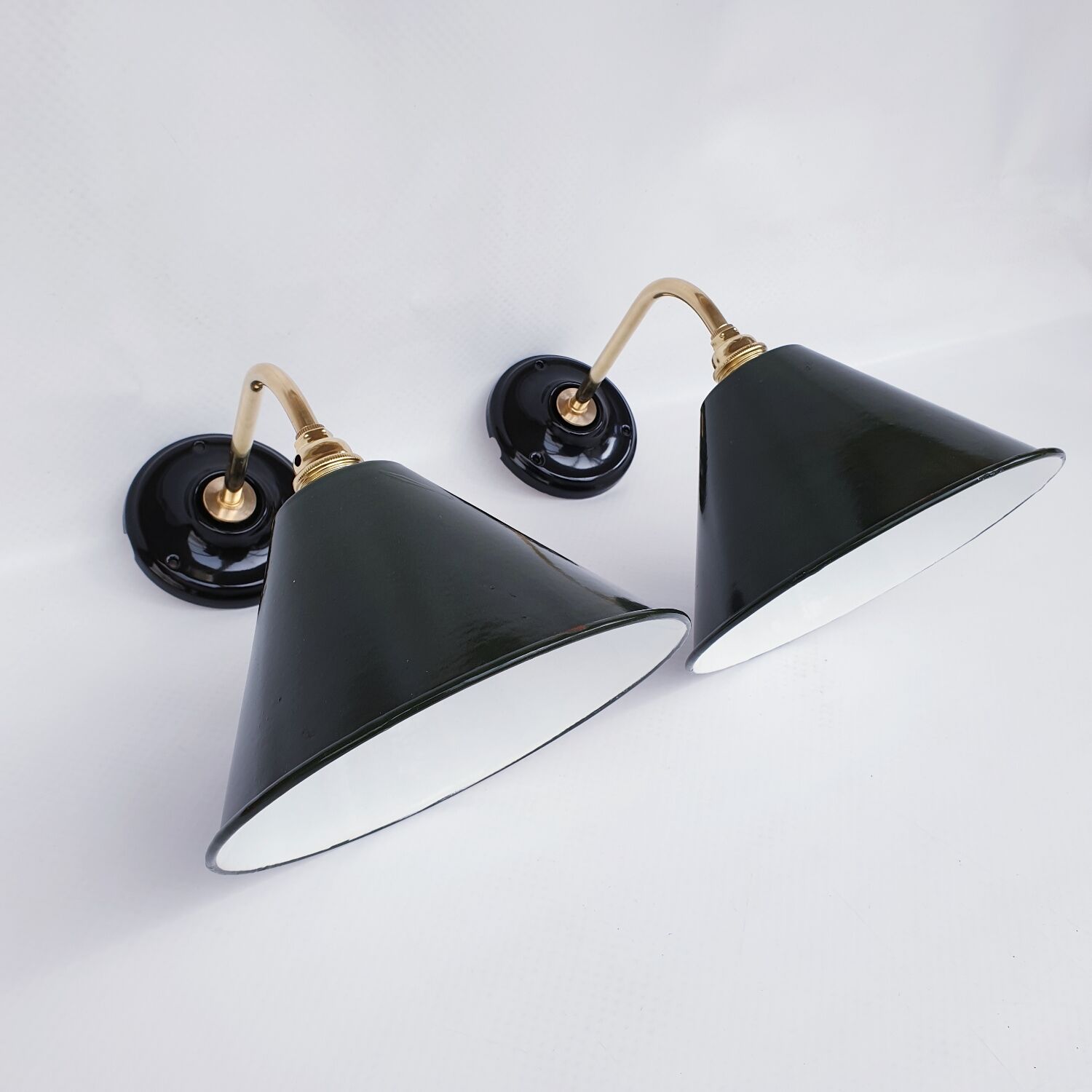 Pair of antique enamelled sheet metal wall lights