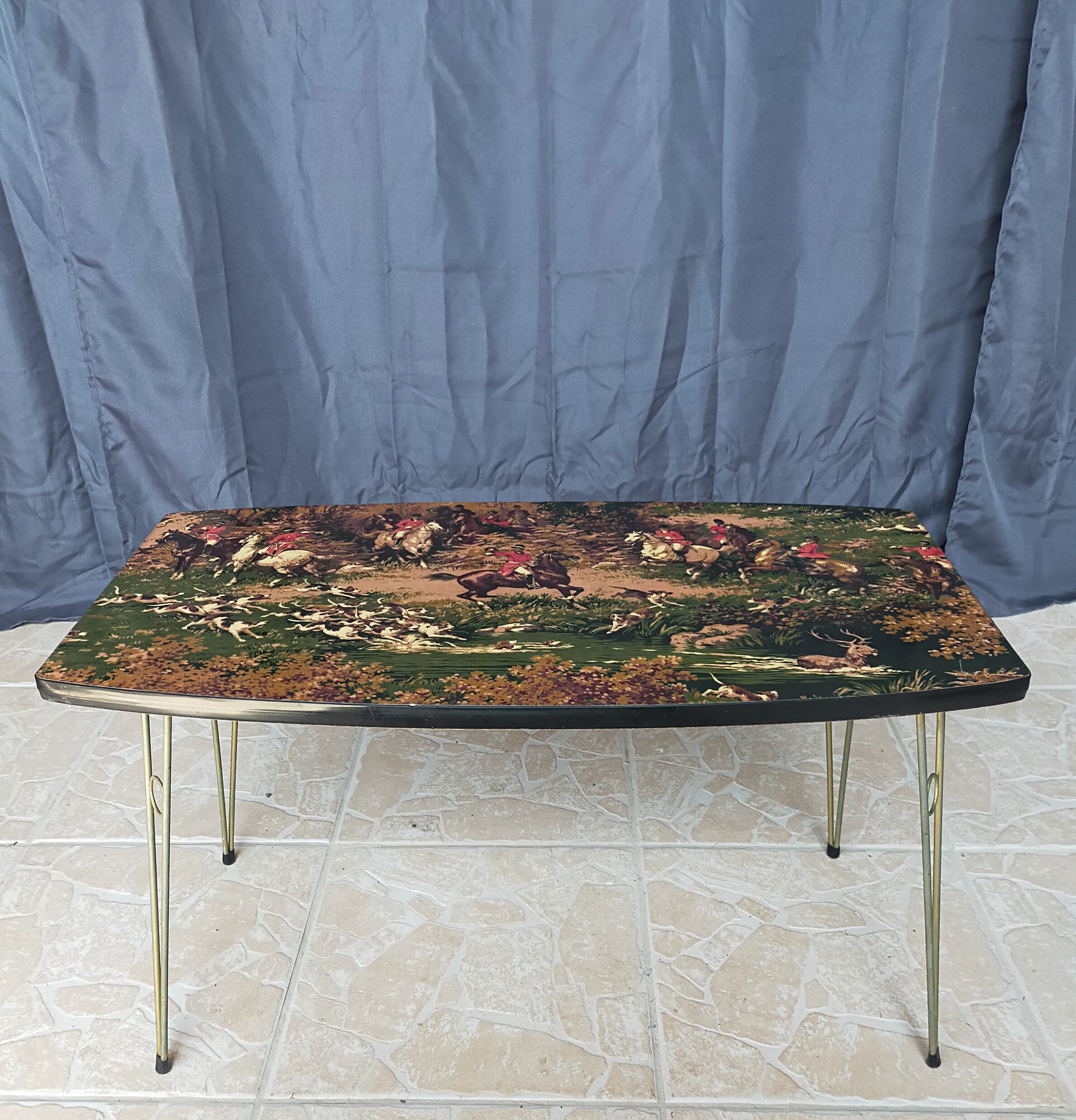 Vintage coffee table hunting scene