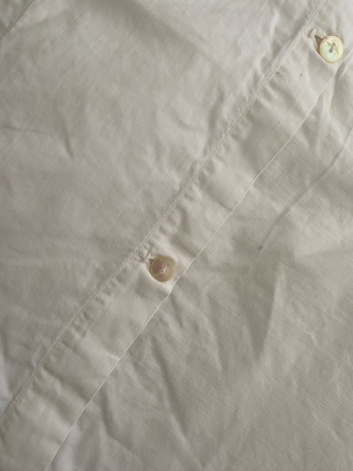 White cotton pillowcase with monogram BC.