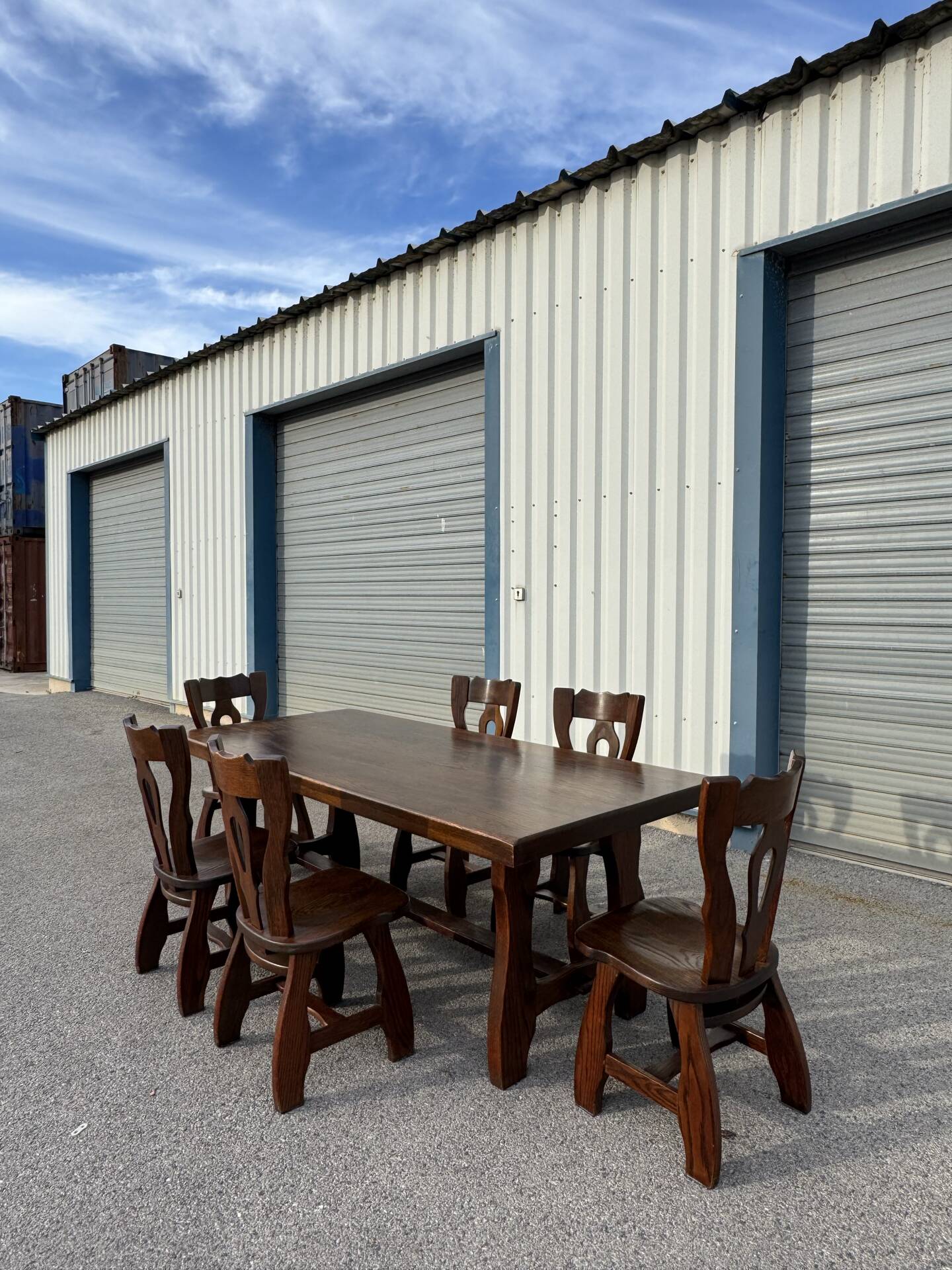 Dining table and 6 chairs by Guillerme and Chambron