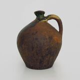 Old goat, jug, gargoulette, water pitcher in glazed green sandstone. nineteenth century