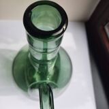 Pair of blown glass wine decanters in blue/green hues.