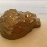 Golden cherub head