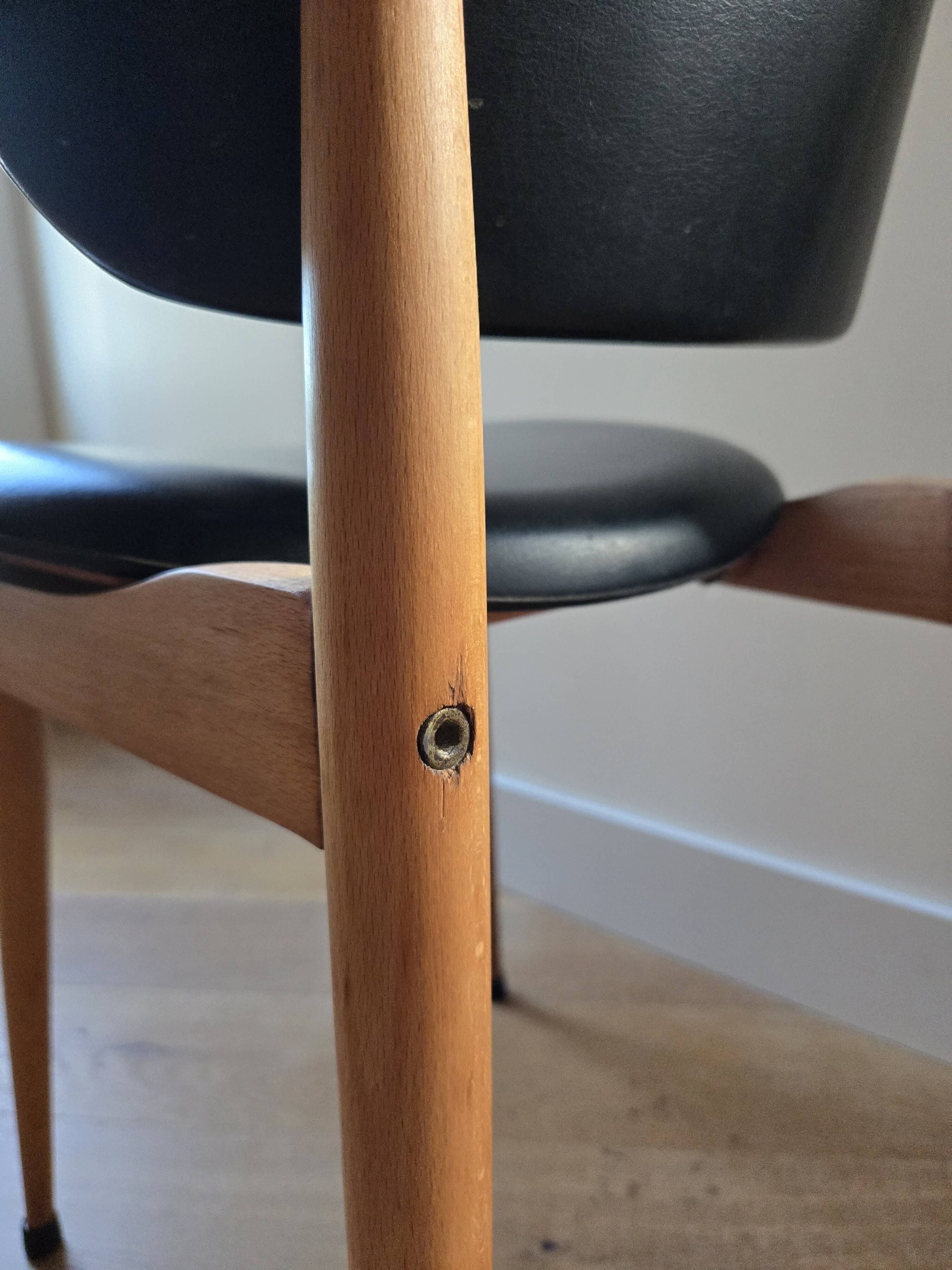 Pair of Baumann Pegasus chairs in wood and leather - design by Pierre Guariche