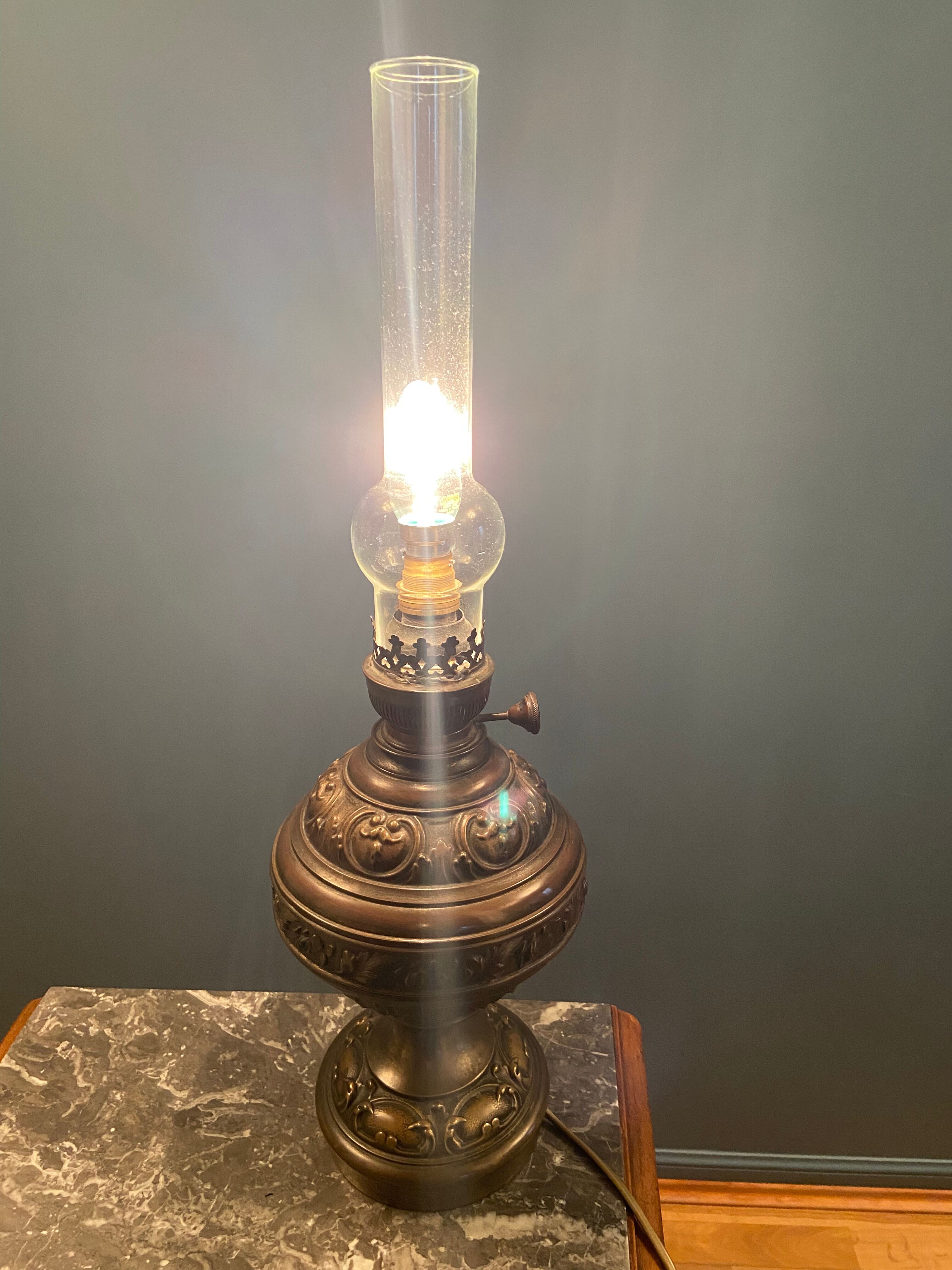 Nineteenth electrified brass kerosene lamp