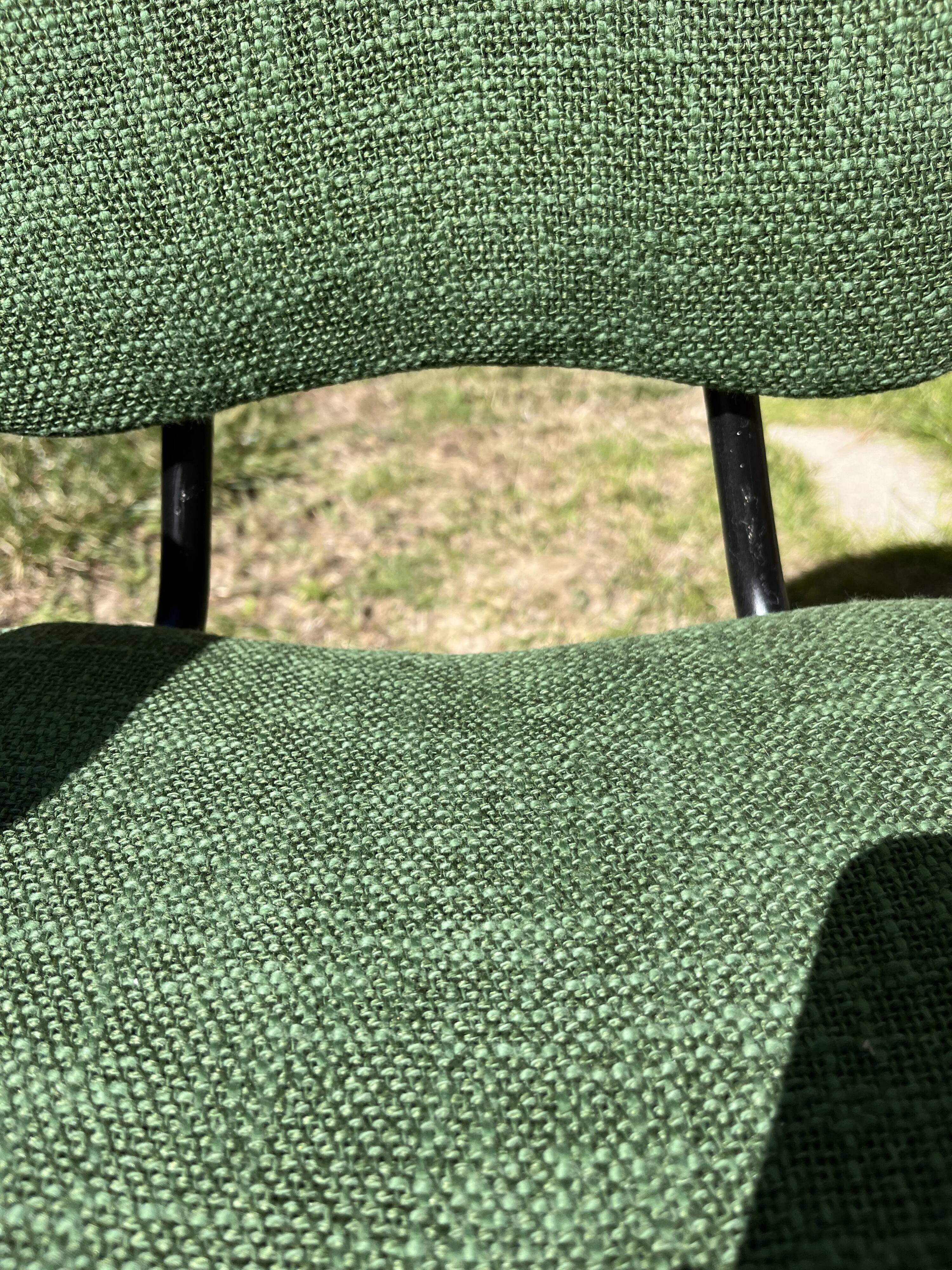 50s chair with armrests.