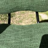 50s chair with armrests.