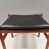 Danish designed footstool in teak wood and black skai “imitation leather”