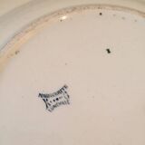 Plat rond en terre de fer décor marguerite KG Lunéville, XIXème s.