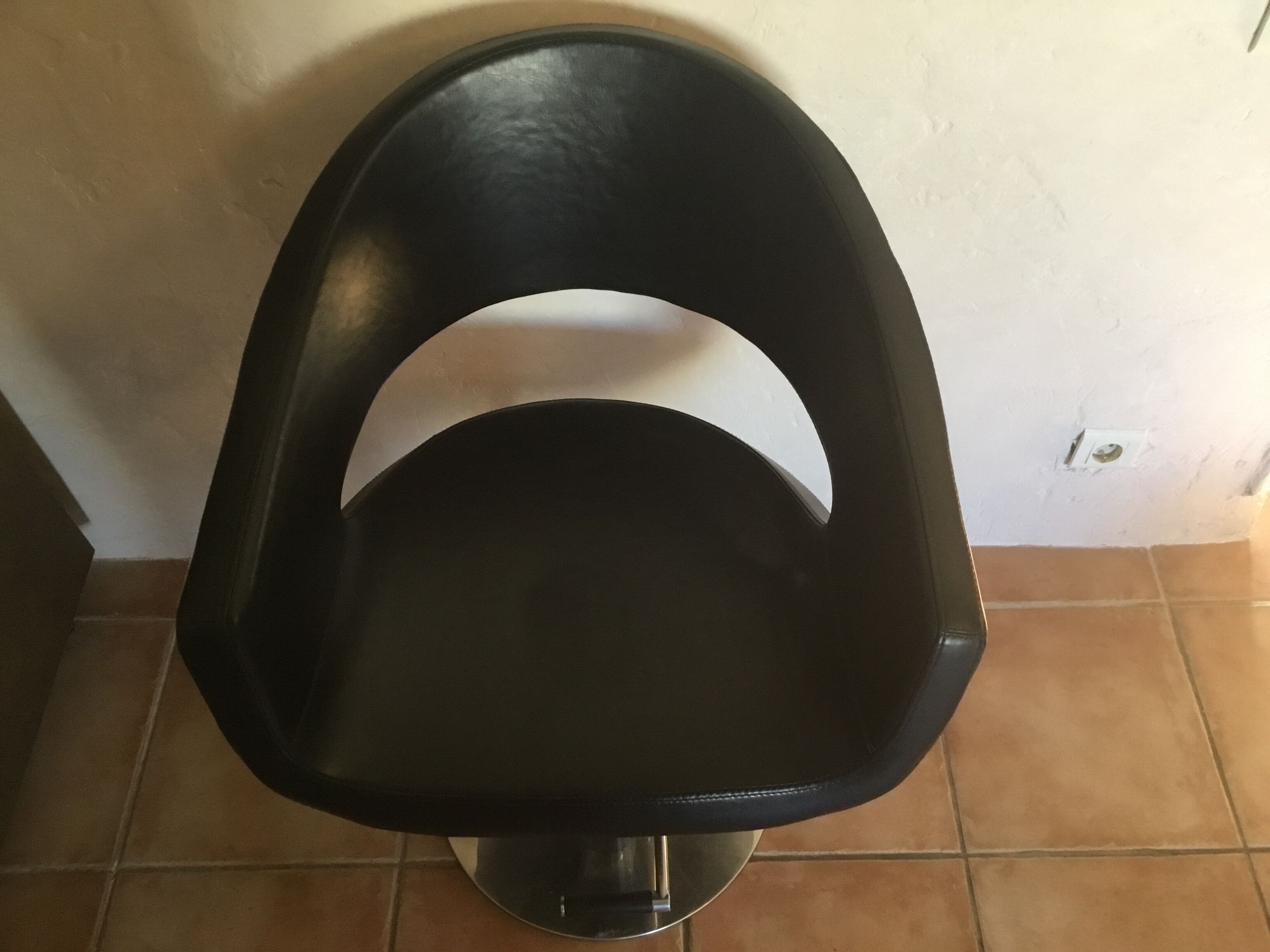 Professional vintage chair sitting in leather and chrome feet adjustable