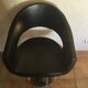 Professional vintage chair sitting in leather and chrome feet adjustable