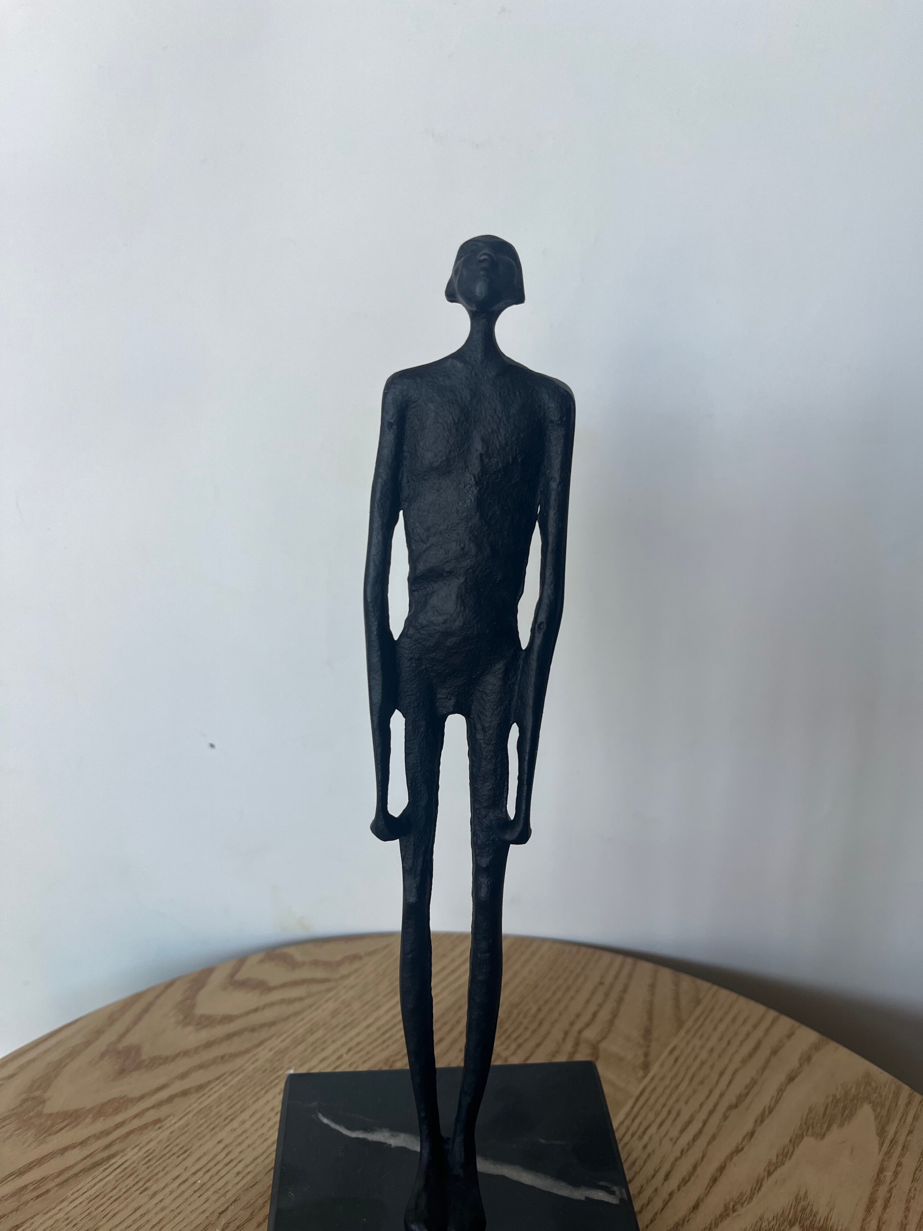 Standing Man by Giacometti