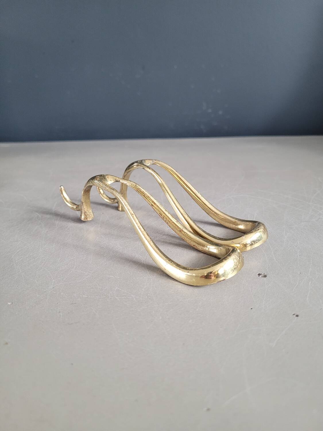 Antique brass pipe holder