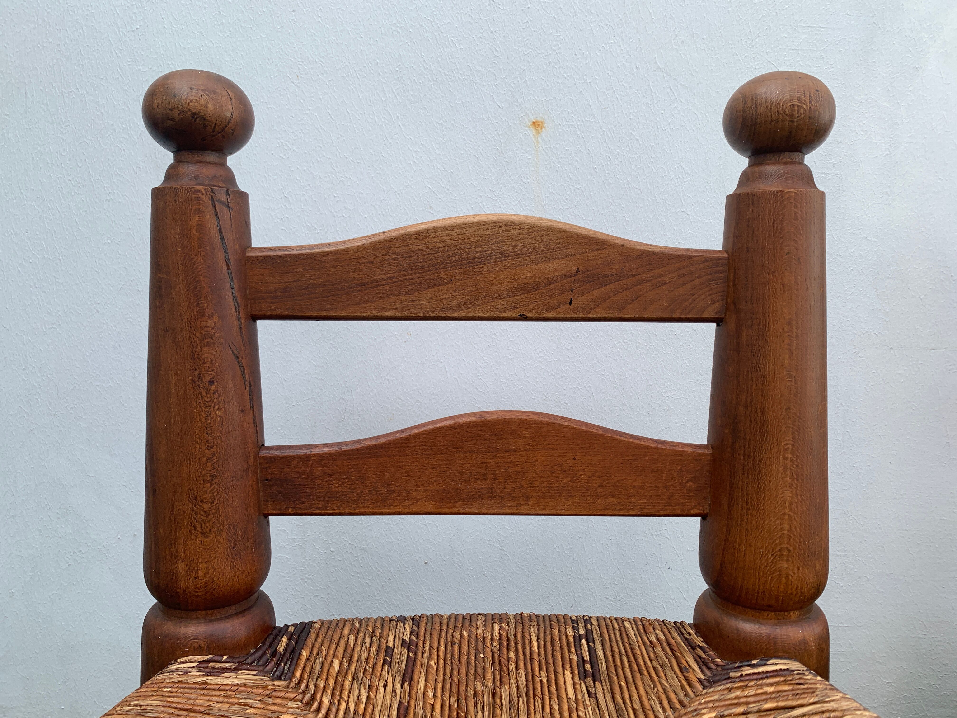 Pair of antique low fire chairs made of wood and straw