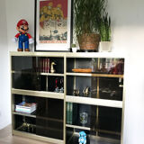 Shelves of black and gold windows