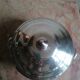 silver metal vegetable dish with crossed ribbon decoration