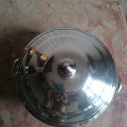 silver metal vegetable dish with crossed ribbon decoration