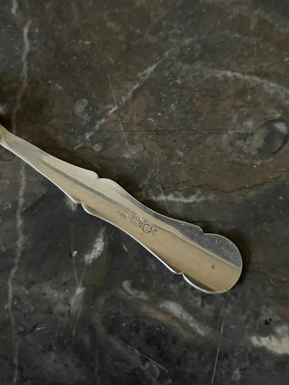 12 silver mocha spoons with flower decoration dating from 1916