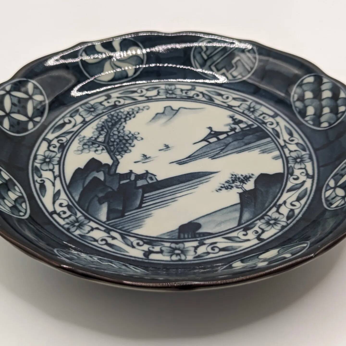 Old signed blue ceramic plate with landscape decoration, Japan