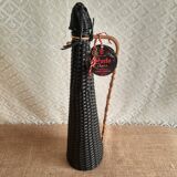 Glass bottle covered with black scoubidou with twisted golden handle - vintage
