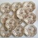 Set of 11 octagonal plates with English faience flowers 1870