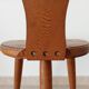 Low brutalist tripod chair in solid oak from the 1960s.