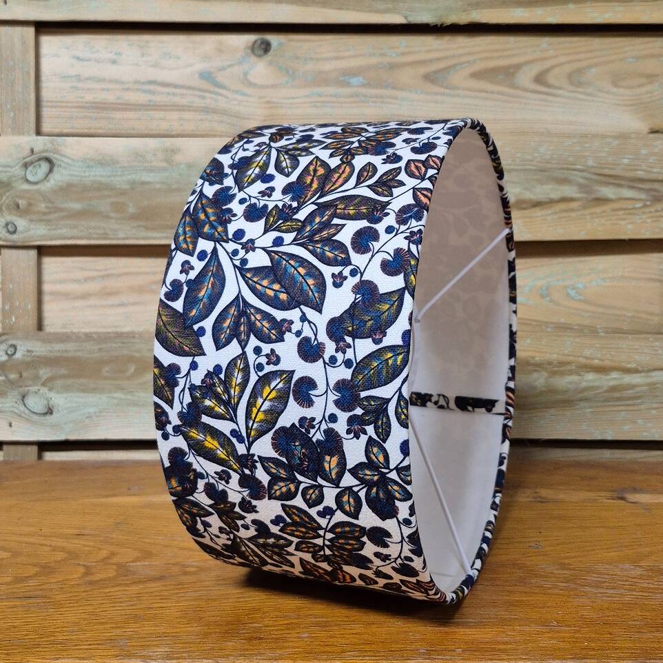 Vintage lamp with glass block and blue floral shade