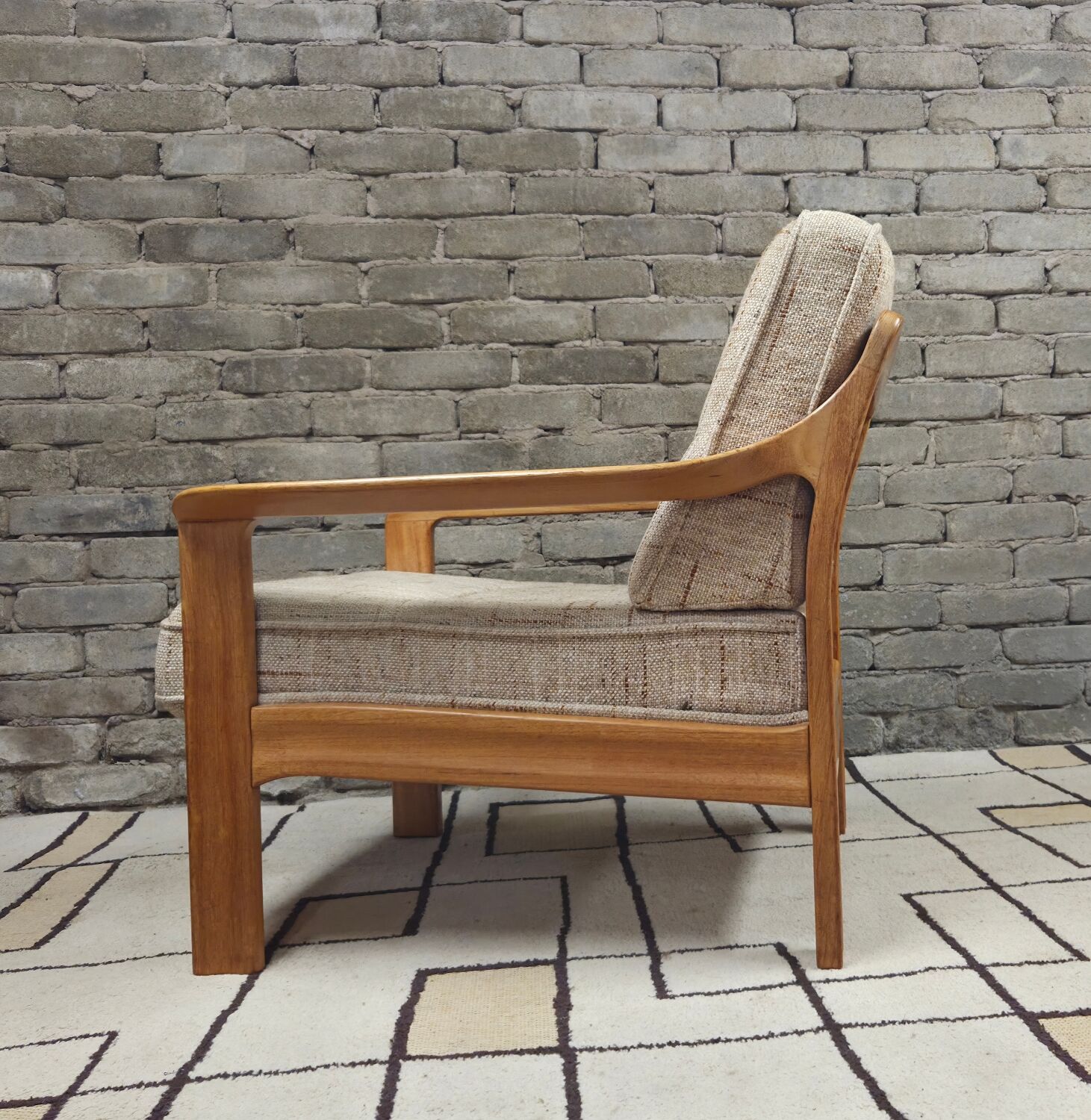 Danish canapé and its 1970s teak armchair