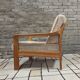 Danish canapé and its 1970s teak armchair