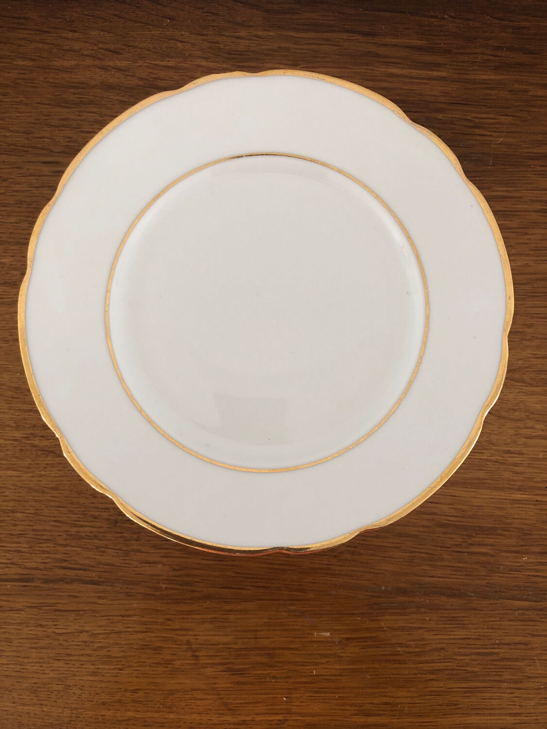 12 white porcelain dessert plates from Limoges CG Cie