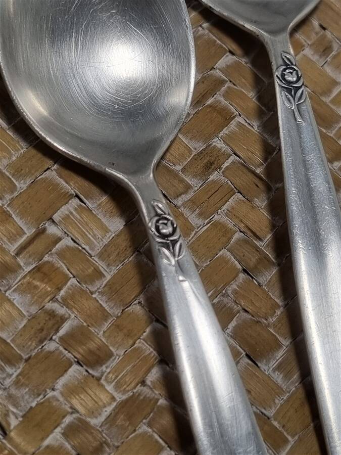 Small silver-plated metal spoons