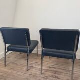 Black leather armchairs