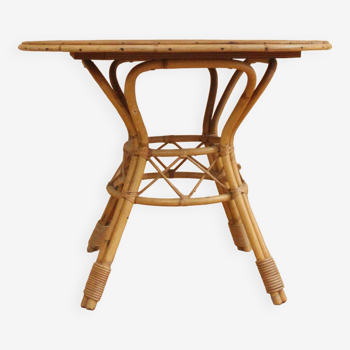 Rattan and wood dining table