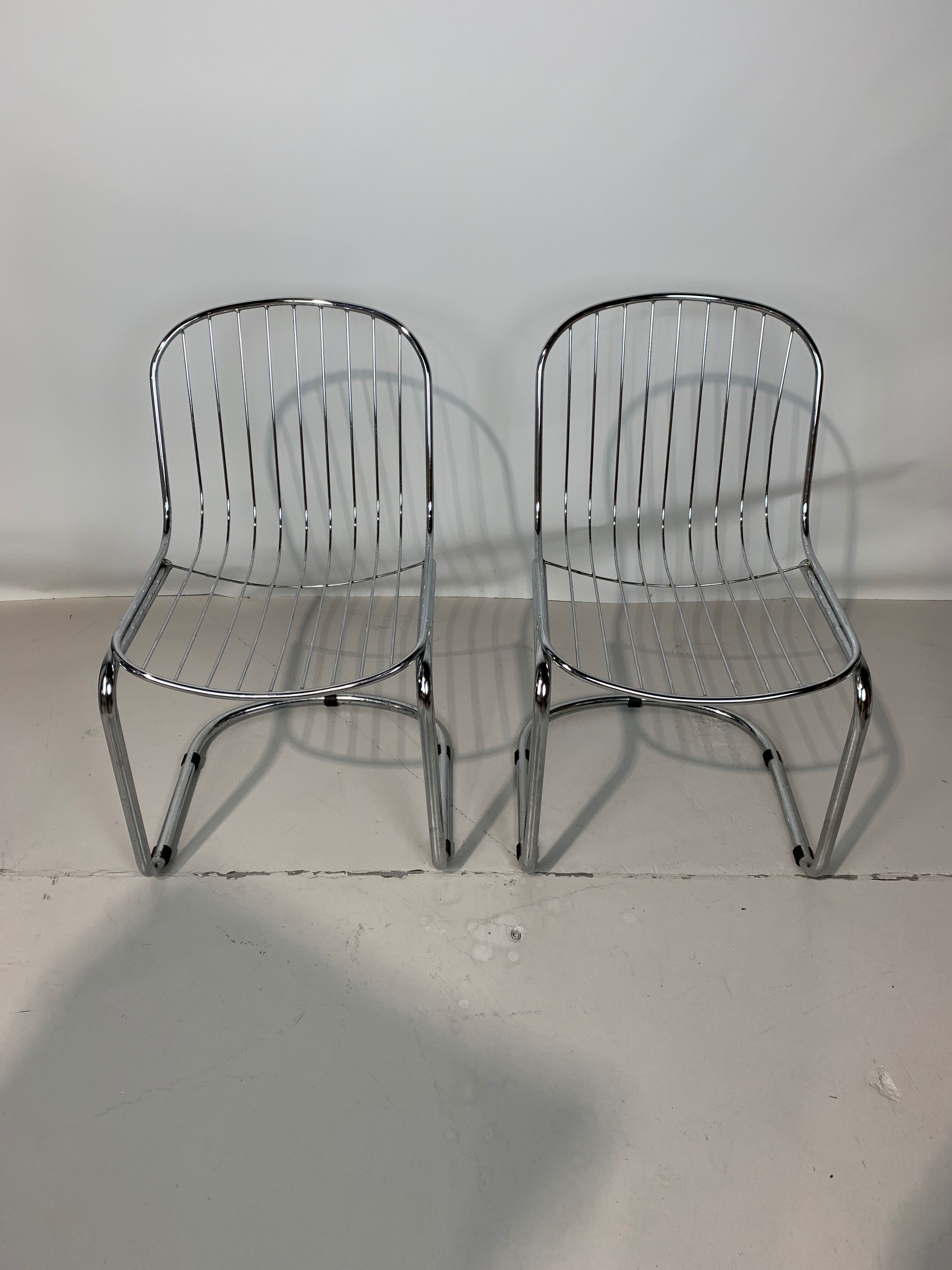 Pair of chairs by Gastone Rinaldi