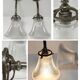 Pair of bronze and glass sconces  1900