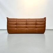 Three-seater Togo sofa in dark cognac leather by Michel Ducaroy for Ligne Roset.
