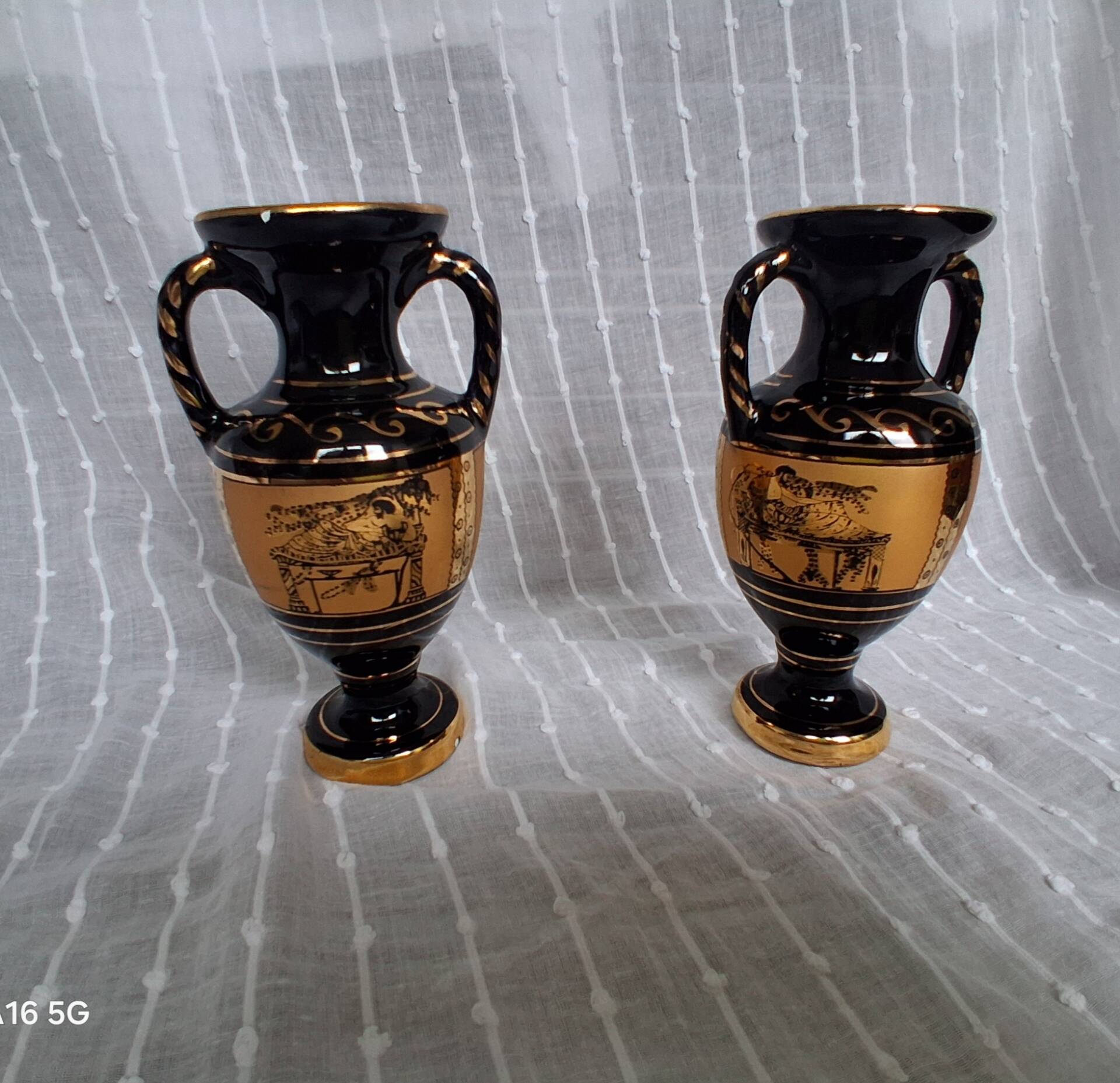 Pair of vases in ancient Greek style gilded with 24-carat gold.