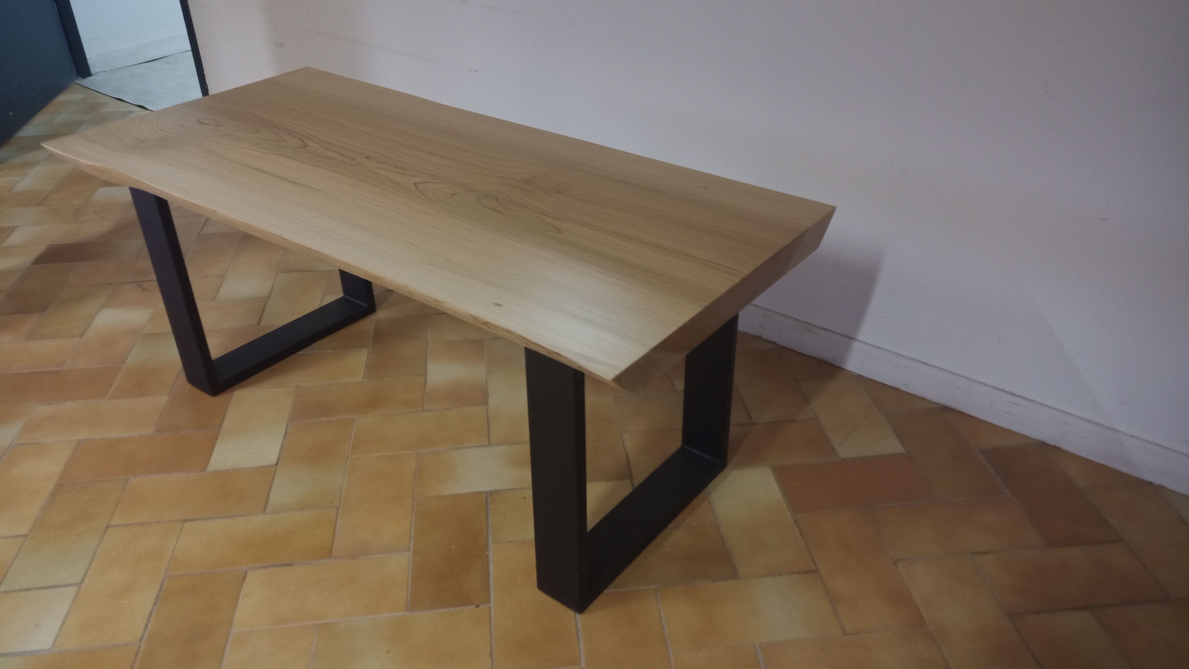 Design coffee table in natural wood