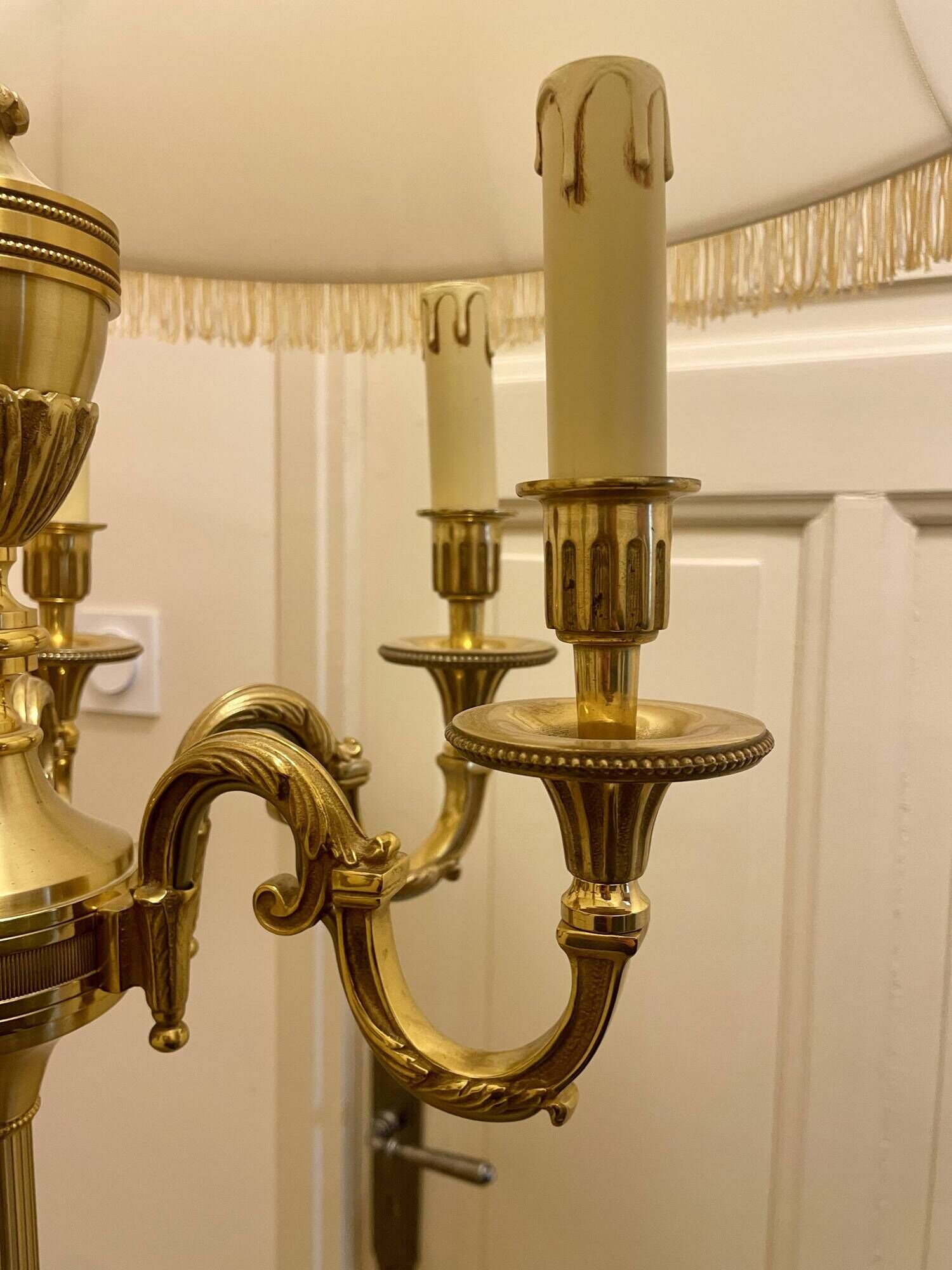 Bronze floor lamp by Lucien Gau, with a six-light shade model 16136.