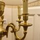 Bronze floor lamp by Lucien Gau, with a six-light shade model 16136.