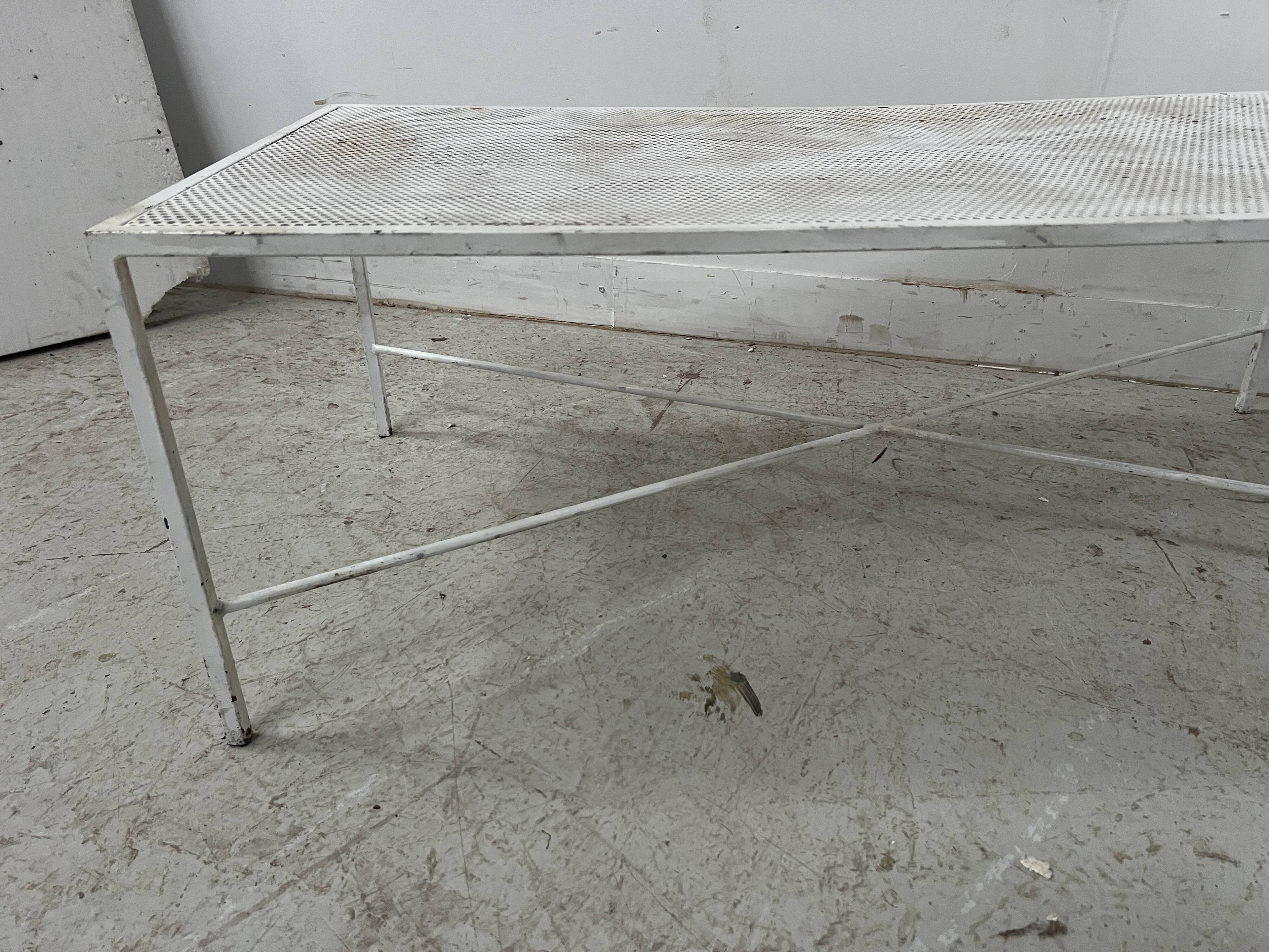 Painted wrought iron coffee table, 20th century.