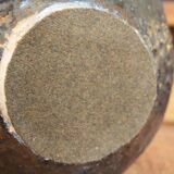 Stoneware lamp with cane shade